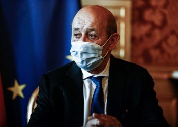 French Foreign Minister Jean-Yves Le Drian looks on before signing an agreement with his British counterpart (not seen) in Paris on July 26, 2021. (Photo by Sameer Al-DOUMY / AFP) (Photo by SAMEER AL-DOUMY/AFP via Getty Images)